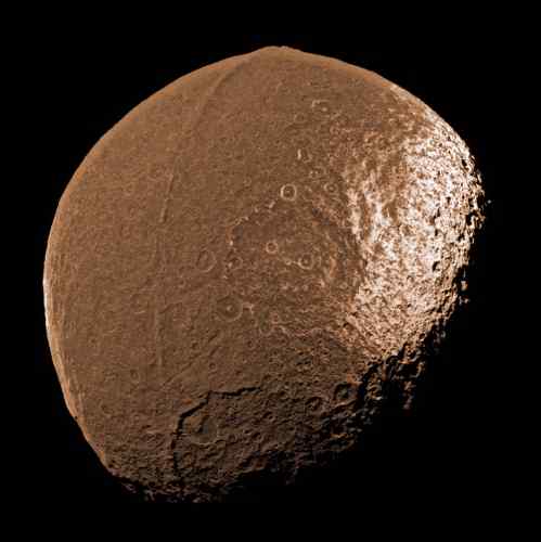Notice the distinct equatorial ridge that gives Iapetus the characteristics of a seed.