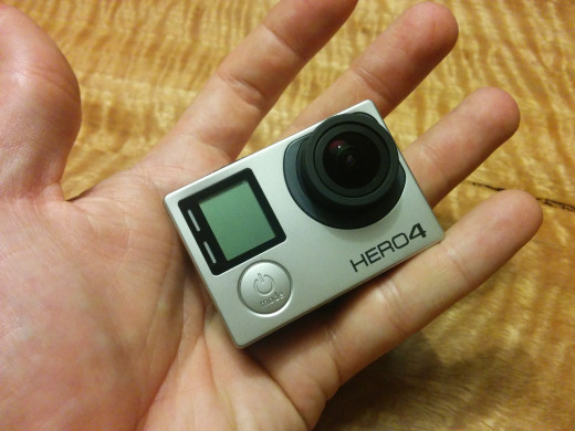 Big hand or tiny camera? No, its just a really really tiny camera.