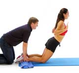 hamstring exercise with a personal trainer