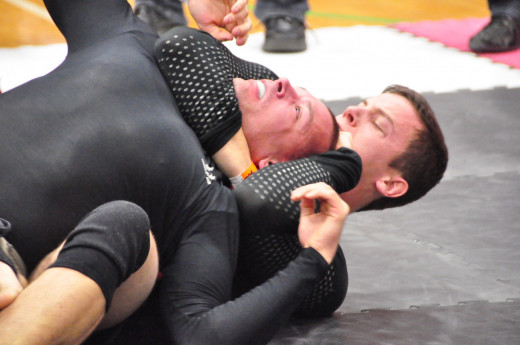 Different grapplers rely on a number of different grip variations to finish the RNC, but they all use the same basic mechanics.