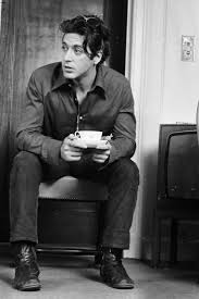 A young Sal Mineo enjoys a cup of coffee on the set of one of his films