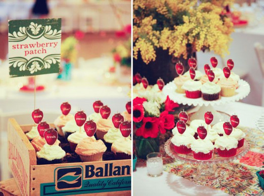 Cupcakes with strawberry label used as place cards