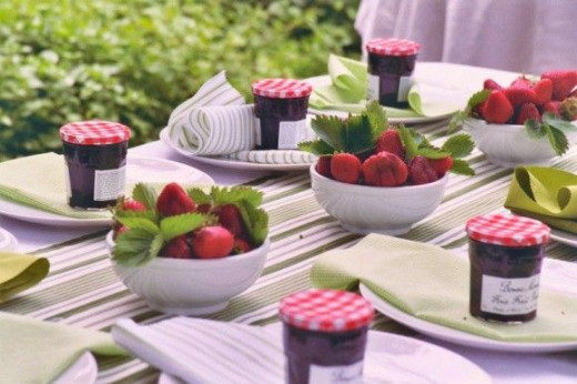 Strawberry jam favors can also serve as place cards