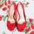 A gorgeous pair of peep-toes in red strawberry.