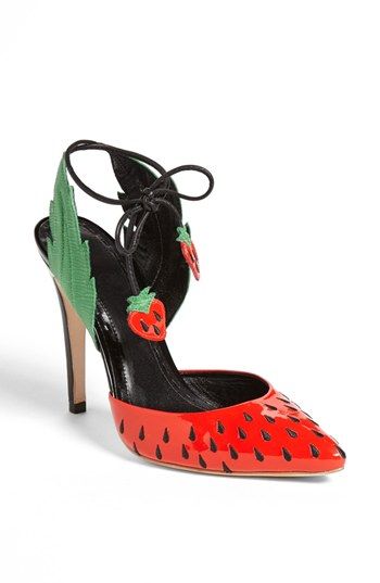 Stilettos in red with black cutouts and leaves for the ankle, and a nice strap adorned with strawberries at the end.