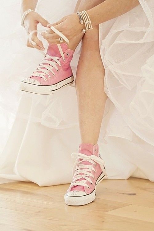 For the non-conventional bride: strawberry pink sneakers.