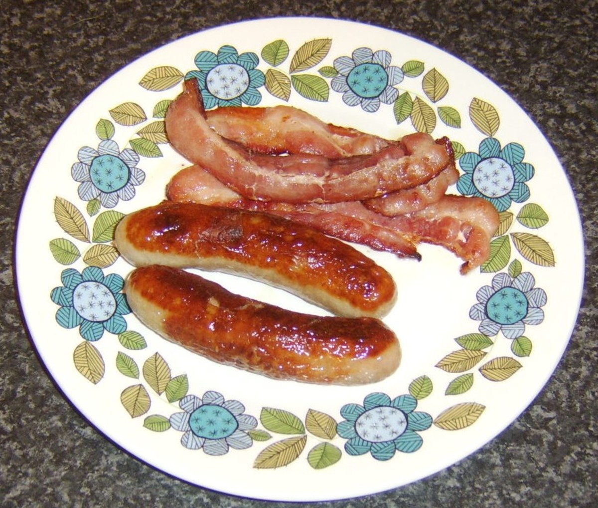 Cooked sausage and bacon