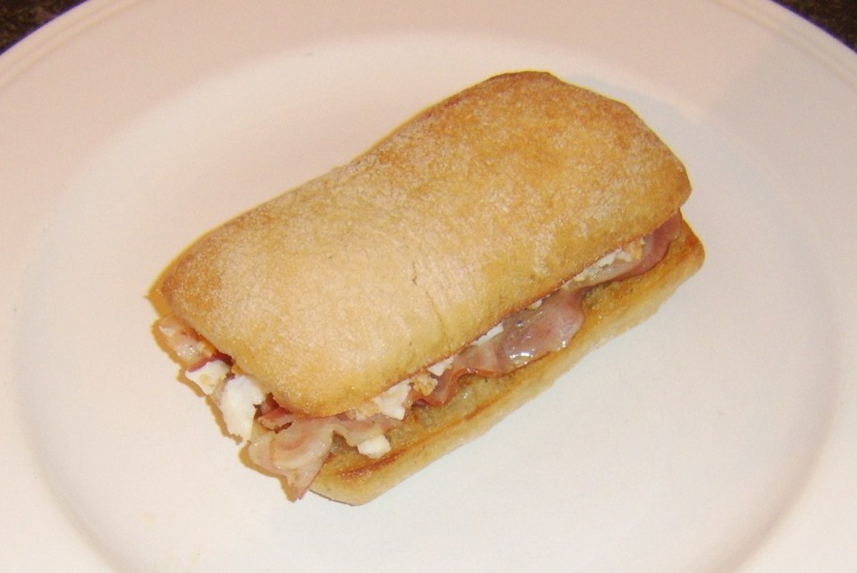 Ciabatta roll is closed over for cutting