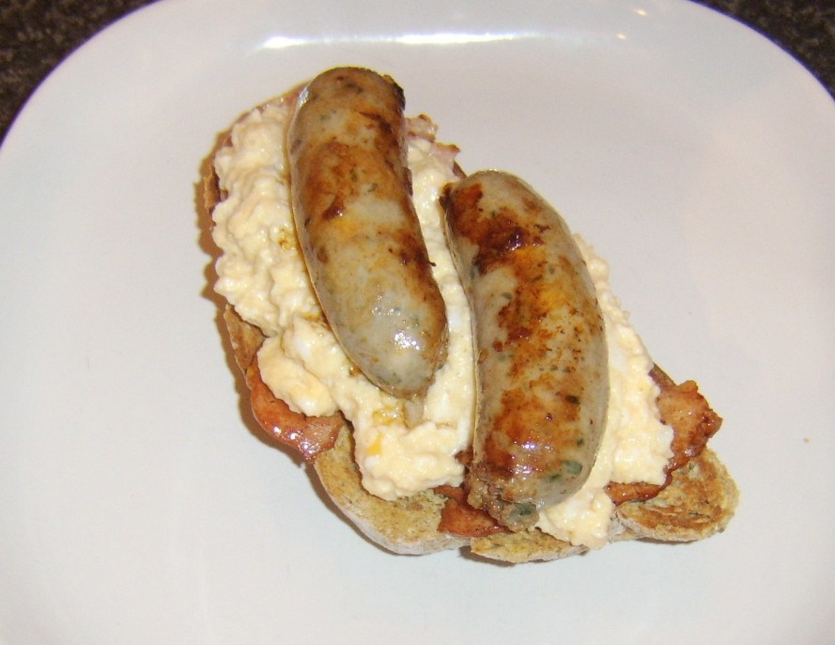 Sausages are laid on scrambled egg