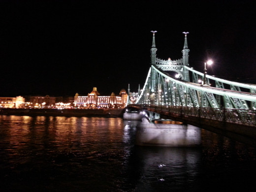 The Liberty Bridge offers a stunning nighttime approach to the Gellert Bath complex.