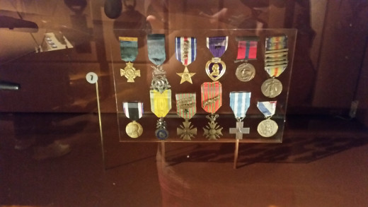 One Marine received a lot of medels for his bravery! Can you spot the one that we got to hold in class? 