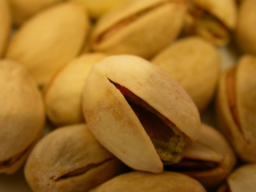 Many find that eating a few pistachios helps satisfy cravings for greasy, salty junk foods, minimizing the risk of emotional or stress eating.