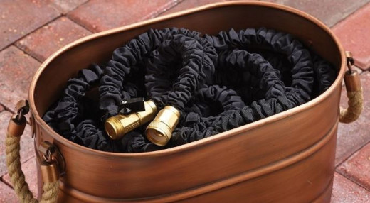 XHose Pro with Brass Fittings in a Copper Container