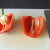 Bell pepper is halved and seeded