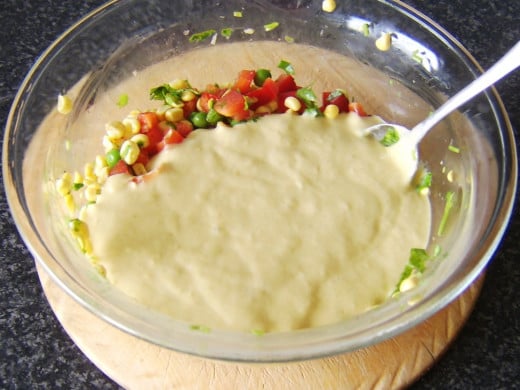 Batter is poured in to vegetables
