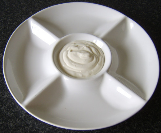 Soured cream is added to serving plate