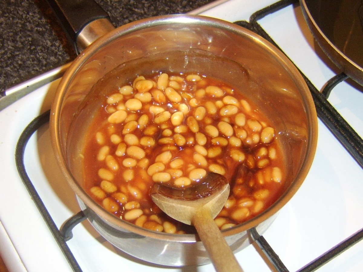 Beans are slowly warmed on a low heat