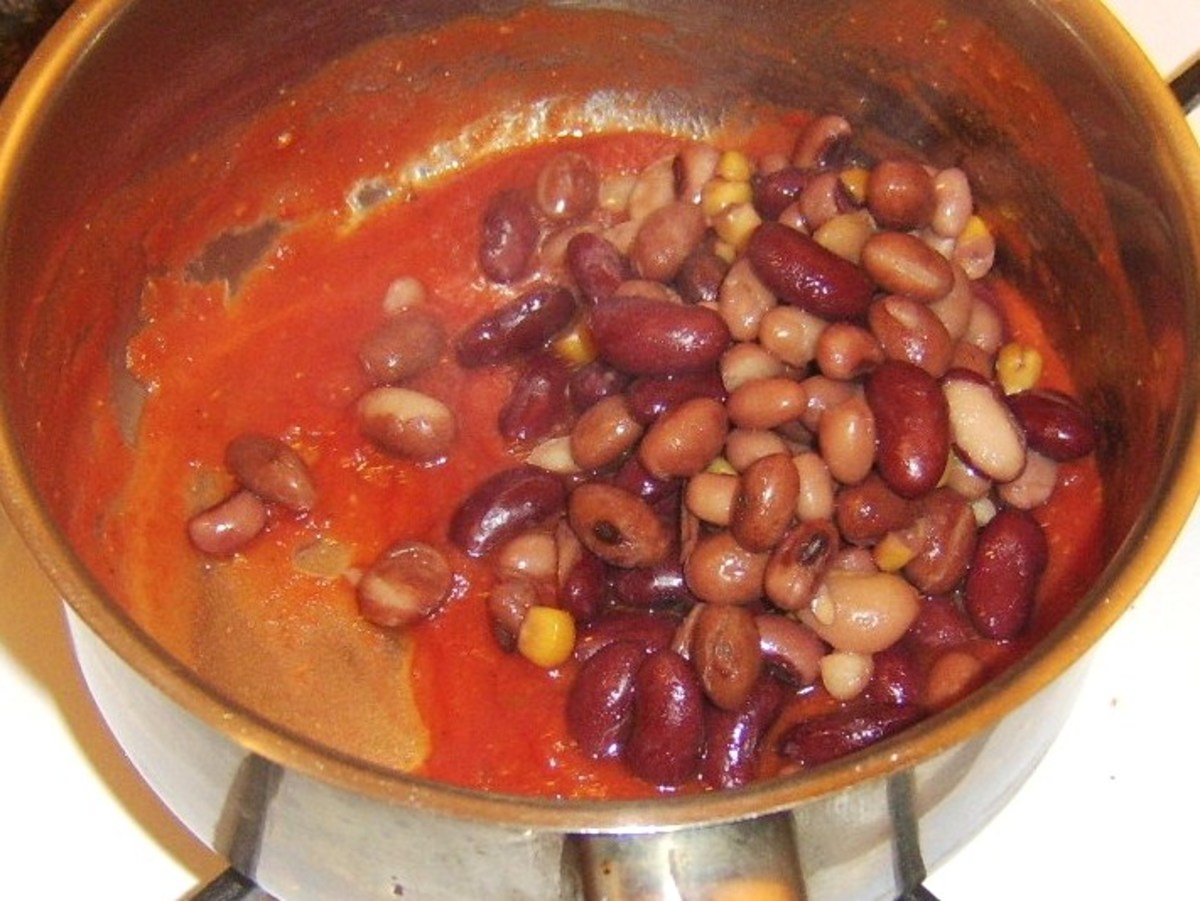 Five bean salad is added to tomato sauce