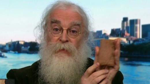 Irving Finkel holding the Babylonian tablet. 