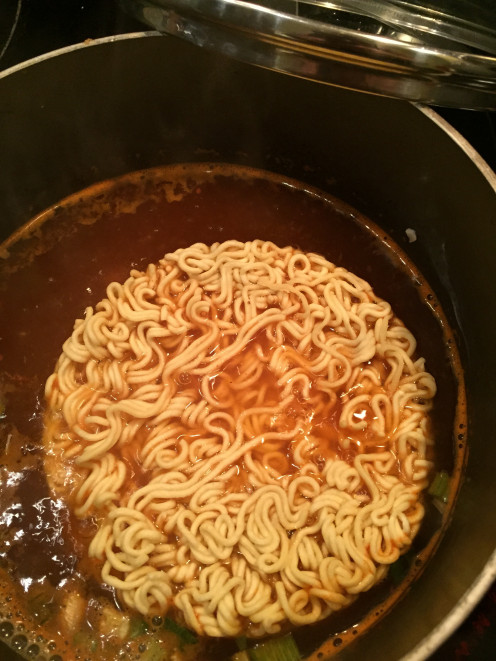 Put the noodles in. 
