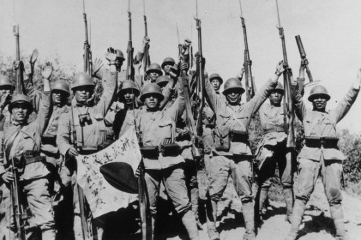Japanese troops celebrating victory over the Chinese defence forces outside Beijing (1937).