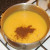 Ground cumin is added to blended soup