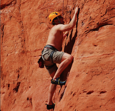 A rock climber attacks Castle Rock.