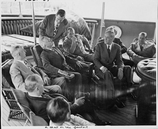 Cumberland's coach and student manager, George E. Allen, in the suit and seated to the right of President Harry Truman in this 1946 photo, later had a distinguished career as a presidential consultant.