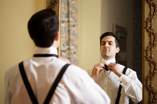 "I sure wish I was with the ocean right now instead of having to put on this ridiculous bow tie."