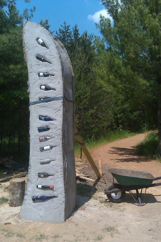 This is the swift habitat sculpture tower in the process of being made, wine bottles are inbedded in the sides.