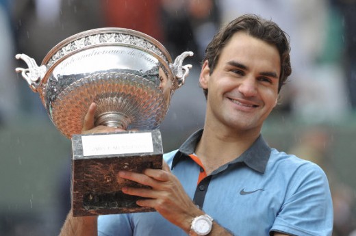 with his French Open trophy with his French Open trophy