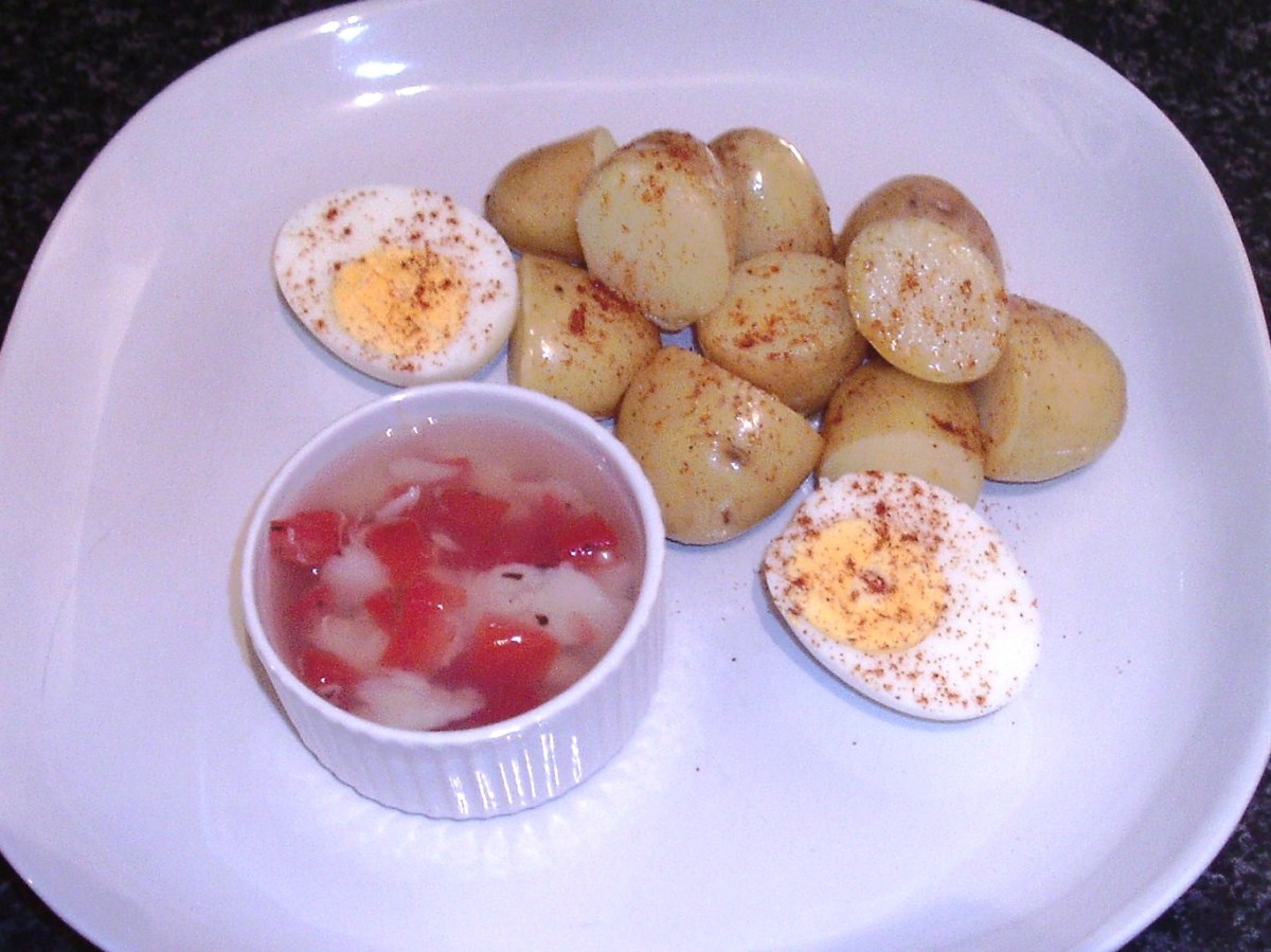 Tomato and basil jellied cod served with paprika spiced egg and potatoes