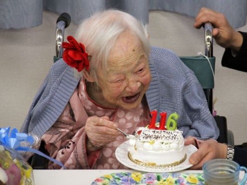 At onetime the world's oldest person, Misao Okawa, celebrates her 116th birthday at the nursing home in Osaka,  Japan.