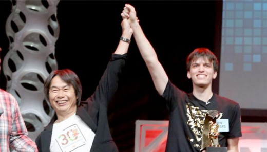 John Numbers won the final stage game (Mario maker) and is celebrating near Shigeru Miyamoto.