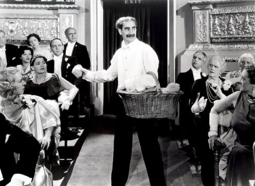 Groucho Marx distributing bread.