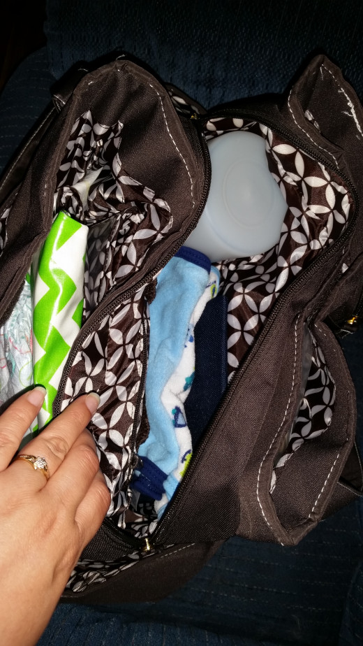 Bottle warmer stuffed in a corner in my diaper bag.