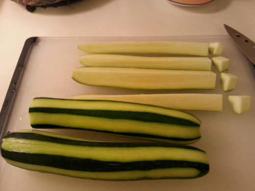 Cut off and discard ends, quarter lengthwise, then slice in 1/2 inch pieces.