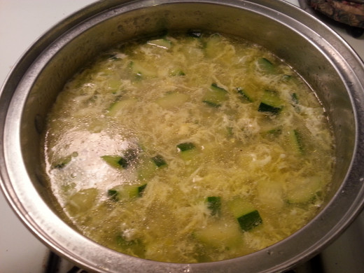 When soup is cooked, remove from heat and stir in eggs.