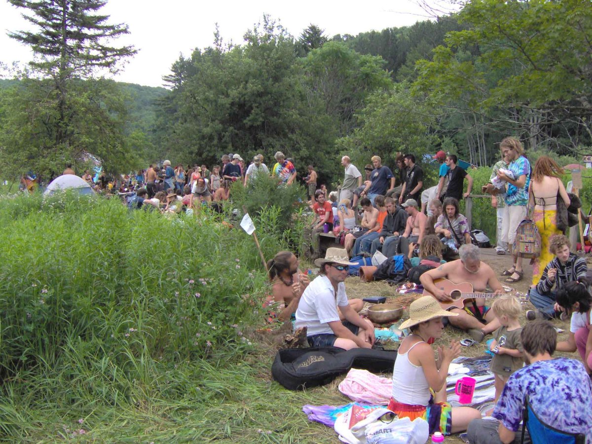 Hippies trade goods at a Rainbow gathering. Tobacco and Weed are best for trading.