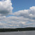 A sail boat barely visible in the distance. A sail boat barely visible in the distance.