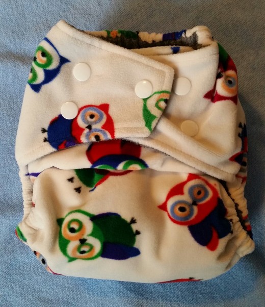 Kawaii Baby Bamboo Charcoal One-Size diaper closed at the smallest on waist using the tummy cross over snaps.