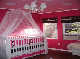 A mosquito net is a must for baby and there are a number of ways to put it into the room without it looking ugly.