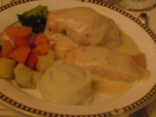  A duet of chicken and fish, stuffed with crabmeat was served for dinner, although appetizers left the majority of our guests completely stuffed. 