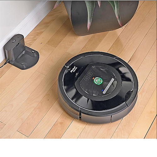 Roomba getting ready to dock on the charging station.
