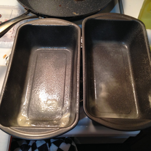The pans should be greased and then sprinkled with flour.