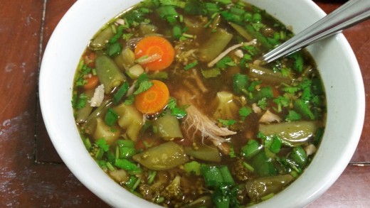 This pork bone broth serves as a stand alone meal when shredded pork, beans, carrots, onions, and swiss chard are added to the reheated bone broth.
