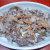 A plate of sannakji. Live octopus seasoned with sesame oil and topped with sesame seeds. A plate of sannakji. Live octopus seasoned with sesame oil and topped with sesame seeds.
