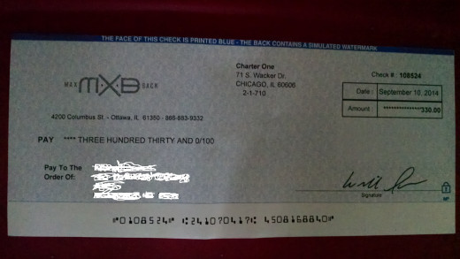 This is the check that MaxBack sent me for $330.00 for the sale of my AT&T Samsung Galaxy S5 Active.  My personal information has been whited out for privacy reasons.