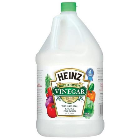 The combination of white vinegar and baking soda creates a powerful substitute for chemical-based housecleaning products.