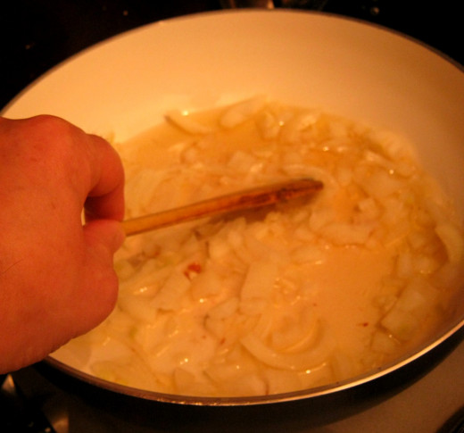 Fry the chopped onion until soft.